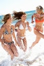 Group Of Girls On Beach Holiday Royalty Free Stock Photo