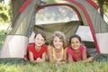 Group Of Girls Having Fun In Tent In Countryside Royalty Free Stock Photo