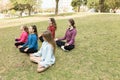 Group of girls practicing yoga