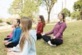 Group of girls practicing yoga