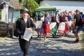 Group of girls running during Easter Wet Monday in Holloko village, Hungary