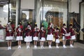 A group of girls sing Christmas carols around Covent Garden... Royalty Free Stock Photo