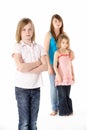 Group Of Girls Together In Studio Looking Unhappy Royalty Free Stock Photo