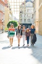 Group of girls walking through downtown - women trip Royalty Free Stock Photo