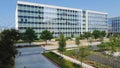 Group of glass office building with nice landscaping and outdoor recreation yard in business center downtown Plano, Texas, USA Royalty Free Stock Photo