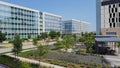 Group of glass office building with nice landscaping and outdoor recreation yard in business center downtown Plano, Texas, USA Royalty Free Stock Photo