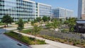 Group of glass office building with nice landscaping and outdoor recreation yard in business center downtown Plano, Texas, USA Royalty Free Stock Photo