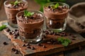 a group of glasses of chocolate mousse
