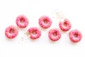 Group of glazed pink donutes. Sweet bakery background