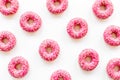 Group of glazed pink donutes. Sweet bakery background