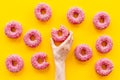 Group of glazed pink donutes. Sweet bakery background