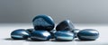 A group of glossy blue stones with dark crevices. Royalty Free Stock Photo