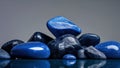 A group of glossy blue stones with dark crevices Royalty Free Stock Photo