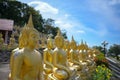 The Group of golden Buddha statues of Phu Salao temple in the Pakse city, Champasak Province, Southern Laos Royalty Free Stock Photo