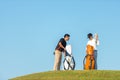 Group golfer asian two man approach on the tee off for swing and hitting golf Royalty Free Stock Photo