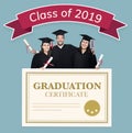 Group of grads with class of 2019 banner Royalty Free Stock Photo