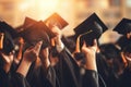 Group of Graduates in Graduation Cap and gowns. Education Concept, Graduation ceremony concept, hats and diplomas raised in hands