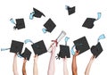 Group of Graduating Student's Hands Holding and Throwing Mortar