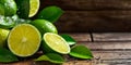 Group of green limes cut in half and placed on wooden table. Generative AI Royalty Free Stock Photo