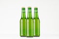 Group green longneck beer bottles 330ml, mock up. Royalty Free Stock Photo