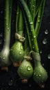 a group of green onions with water drops on them and a black background with a black background and a few green onions with water