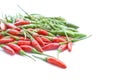 Group of green and red chillies pile on white background Royalty Free Stock Photo