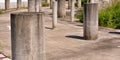 Group of Concrete Pillars at Abandoned Parking Lot