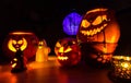 Group of halloween pumpkins on the dark background, dark scenery Royalty Free Stock Photo