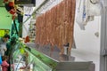 Group of handmade sausages hanging in a butcher shop