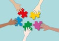 Group of hands holding colourful jigsaw puzzle parts on pastel blue background, Concept for business team or teamwork.