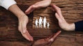 Group Of Hands Protecting Family Paper Cut Royalty Free Stock Photo