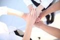 Group handshake with a lot of different hands