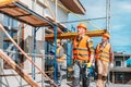 group of handsome builders working together Royalty Free Stock Photo