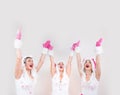 Group of handsome girls feel excited putting their hands up