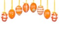 Group of hanging Easter eggs on a white background