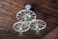 Modern Hanging Lamp Art And Science. Old vintage lighting decor. Lights made of white iron horse-drawn carriage . group