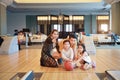 Group of happiness asian family father, mother, son and daughter playing bowling in sport club with happy smiling face during Royalty Free Stock Photo
