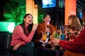 Group of happy asian friends having fun, singing in karaoke club Royalty Free Stock Photo