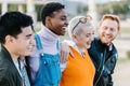 Group of happy best multiracial friends hugging together each other outdoor Royalty Free Stock Photo