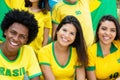 Group of happy brazilian soccer fans Royalty Free Stock Photo