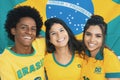 Group of happy brazilian soccer fans in vintage retro look Royalty Free Stock Photo