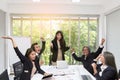 Group of happy business people cheering in office. Celebrate success. Business team celebrate a good job in the office. Asian Royalty Free Stock Photo