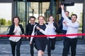 Business people crossing the finish line Royalty Free Stock Photo