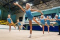 Little girls doing exercise in gym