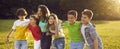 Group of happy children enjoying summer holidays and playing outside all together Royalty Free Stock Photo