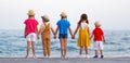 Group of happy children   by   sea in summer Royalty Free Stock Photo