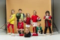 Group of happy children show different sport. Studio fashion concept. Emotions concept. Royalty Free Stock Photo