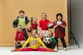 Group of happy children show different sport. Studio fashion concept. Emotions concept. Royalty Free Stock Photo