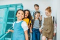 group of happy classmates walking down stairs Royalty Free Stock Photo