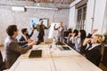 Happy colleagues talking while having business meeting in the office Royalty Free Stock Photo